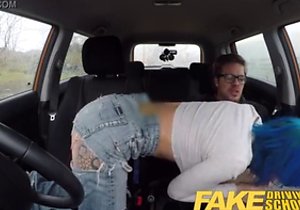 Blue-haired babe gets fucked in a moving car